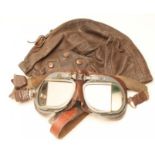 A PAIR OF BRITISH FLIGHT GOGGLES with painted brass frames and leather padding, together with a