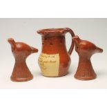 A SLIPWARE PUZZLE JUG, late 19th century, red coloured stoneware probably Soil Hill Pottery, of