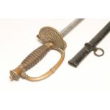 AN OFFICER'S SWORD, c.1850, the 34 1/2" blade etched with drums, shields, swords and the Congan coat