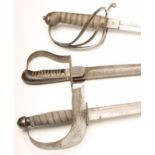 A 1796 TYPE OFFICER'S SABRE, with 32 1/2" curved blade decorated with foliate scrolls, langets