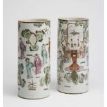 A PAIR OF CHINESE PORCELAIN WIG STANDS of hexagonal form, each with six quatrefoil cut out panels,