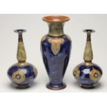 A PAIR OF ROYAL DOULTON STONEWARE VASES, early 20th century, of squat globular form with tall