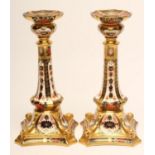 A PAIR OF ROYAL CROWN DERBY CHINA "CASTLEFORD" CANDLESTICKS, modern, painted in the Imari palette