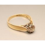 A SOLITAIRE DIAMOND RING, the brilliant cut stone of approximately 0.5cts claw set to a white