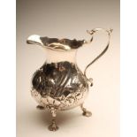 AN EARLY VICTORIAN SILVER MILK JUG, maker Francis Dexter, London 1844, of baluster form with