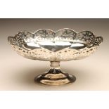 A SILVER PEDESTAL DISH, maker's mark script R&M , Sheffield 1924, the lobed oval bowl with