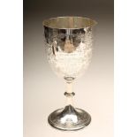A LATE VICTORIAN SILVER TROPHY CUP, maker Wakely & Wheeler, London 1899, the plain "U" shaped bowl