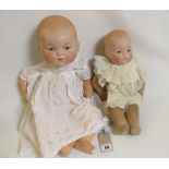 Two Armand Marseille "Dream Baby" bisque head dolls, with blue glass sleeping eyes, moulded closed