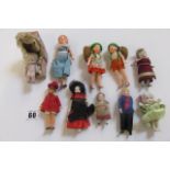 A collection of doll's house dolls, mid 19th century to 1930's, including a pair of dolls in felt