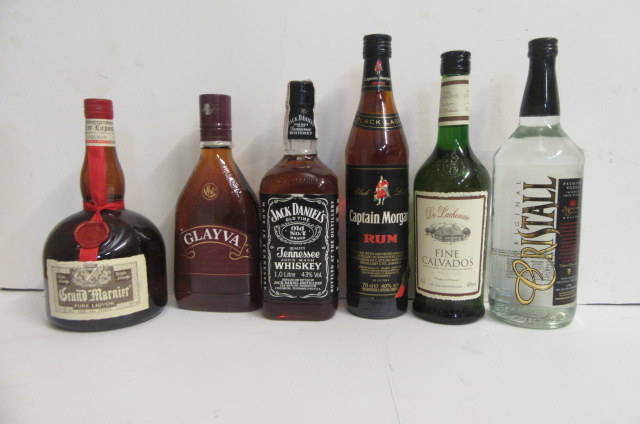 One litre Grand Marnier, one bottle Fine Calvados, one bottle Glayva, one bottle Morgan Rum, one