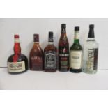 One litre Grand Marnier, one bottle Fine Calvados, one bottle Glayva, one bottle Morgan Rum, one