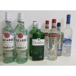 One litre and three bottles Bacardi Rum, two bottles Gordons Gin, two bottles Smirnoff Vodka, one