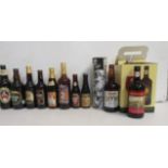 A collection of celebratory bottles of ale, comprising six Timothy Taylors, six Courage, four Bass