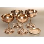 A SET OF FOUR CHINESE SILVER GOBLETS, maker Wang Hing, early 20th century, the shallow circular