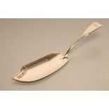 A LATE GEORGE III SILVER FISH SLICE, maker's mark IS or SI, London 1807, in Fiddle pattern, with