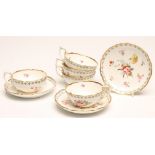 FIVE COALPORT PORCELAIN TEACUPS AND THREE SAUCERS, in New Embossed Shape, painted in polychrome