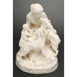 A VICTORIAN PARIAN FIGURE GROUP modelled as a young lady seated on a tree stump, a boy wearing a