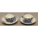 A PAIR OF NANKING CARGO PORCELAIN TEA BOWLS AND SAUCERS painted in underglaze blue with