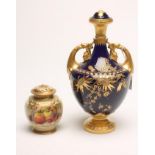 A ROYAL WORCESTER CHINA POT POURRI AND COVER, 1923, of lobed rounded cylindrical form painted in