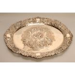 A LATE VICTORIAN SILVER DRESSING TABLE TRAY, maker Mappin & Webb, London 1899, of oval form,