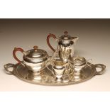 A SILVER FOUR PIECE TEA AND COFFEE SERVICE, maker Adie Bros., Birmingham 1937, of rounded conical
