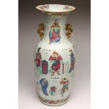 A CHINESE PORCELAIN LARGE VASE of baluster form with flattened beast handles, painted in famille