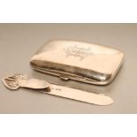 AN EDWARDIAN SILVER CIGAR CASE, maker Fattorini & Sons, Birmingham 1910, of concave oblong form, the