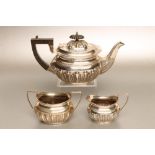 AN EDWARDIAN BACHELOR'S SILVER THREE PIECE TEA SERVICE, maker's mark WA, Birmingham 1902 and