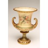 A ROYAL WORCESTER CHINA CAMPANA URN, c.1900, painted in polychrome enamels with wayside flowers on a