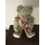 Vintage straw filled mohair teddy bear much loved.