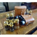 Seven pairs of binoculars inc. 5 brass and leather