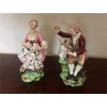 Pair Derby patch mark figures Nos. 51 & 127 Lady and gent with cat and pug