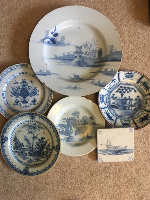 Eight pieces 18th c delft ware inc. charger