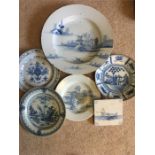 Eight pieces 18th c delft ware inc. charger