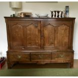 Good 18th c oak mule chest with 4 panel cupboards over 3 drawers