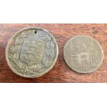 Two Hull medals a Lead works penny 1812 and 1880 Borough Election token.