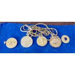Five yellow metal medallions and two chains both 18ct gold 37.5 gms total