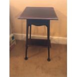 Mahogany occasional table in the arts and crafts manor.