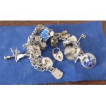 Silver charm bracelet 2.2 ozt total weight