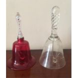 Two small Nailsea glass bells both with clappers
