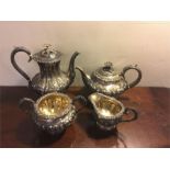 Decorative 4 piece silver tea service London 1843 poss. W Hunter