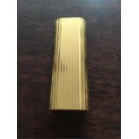 Gilt metal Cartier cigarette lighter c1980