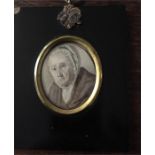 A 19th c miniature on ivory an old lady