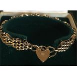 A 9ct gold gate bracelet in original box.