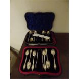 Two sets of ornate tea spoons in shaped presentation boxes 1898 & 1904