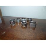 Six various silver napkin rings 4.4 ozt