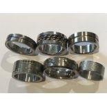 Six various rings including titanium, stainless steel etc.