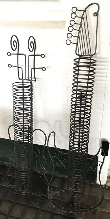 Two metal guitar CD holders