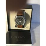 A Bulova watch in excellent condition with original box and manual.