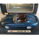 Two Maisto diecast car models - Jaguar XK180 Special Edition, 1:18 and a Jaguar S-TYPE